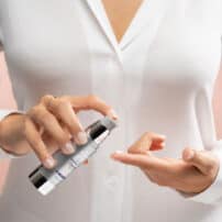 Vitamin C + E Complex by SkinMedica being pumped onto finger - product available in Canada