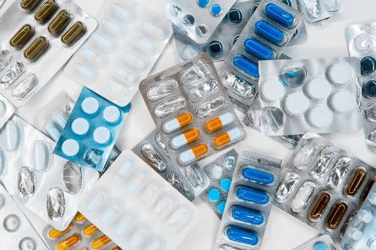 Prescription pills in flay lay view - acne skin care concept