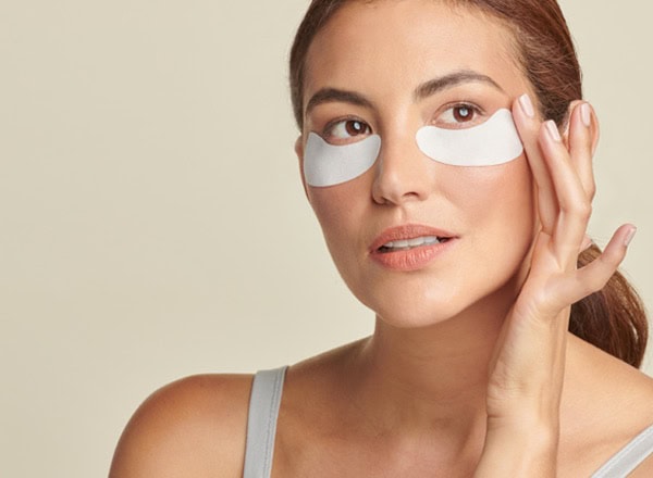 woman wearing Total Eye® Hydrogel Treatment Masks - available in Canada