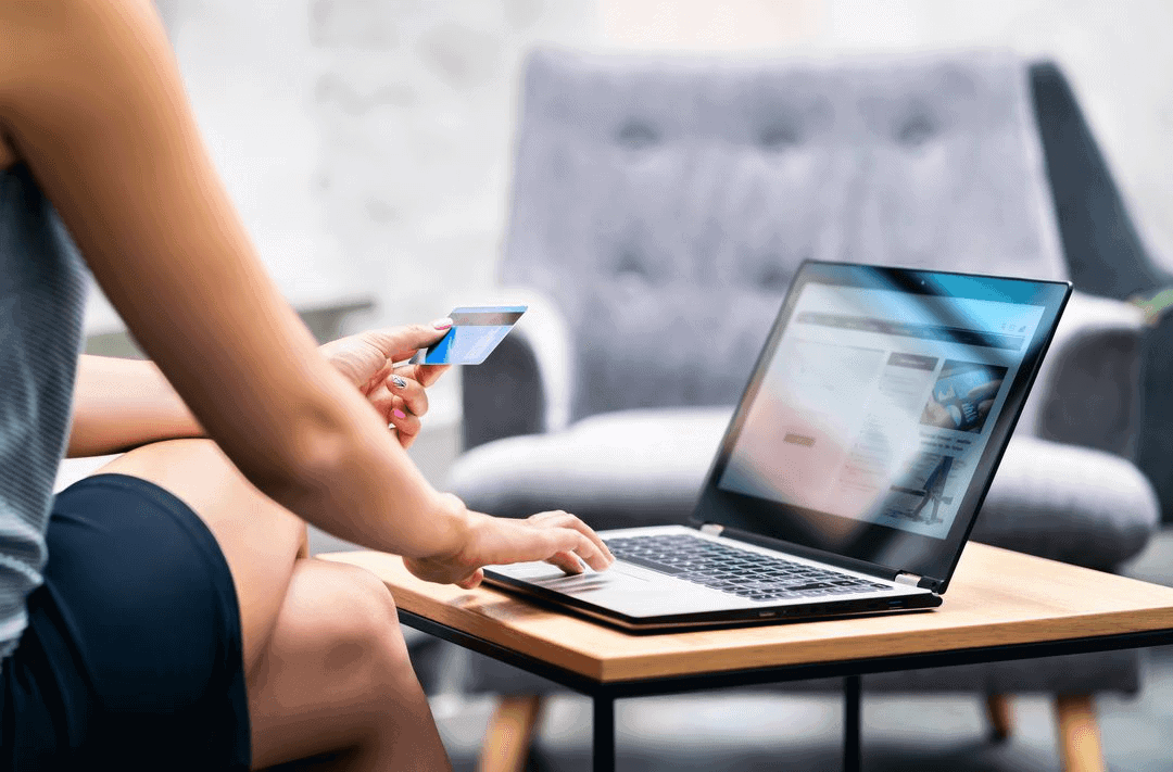 Lady making online purchase and typing in CVV