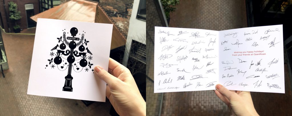 Front and inside of the OXD holiday card with team member's signatures