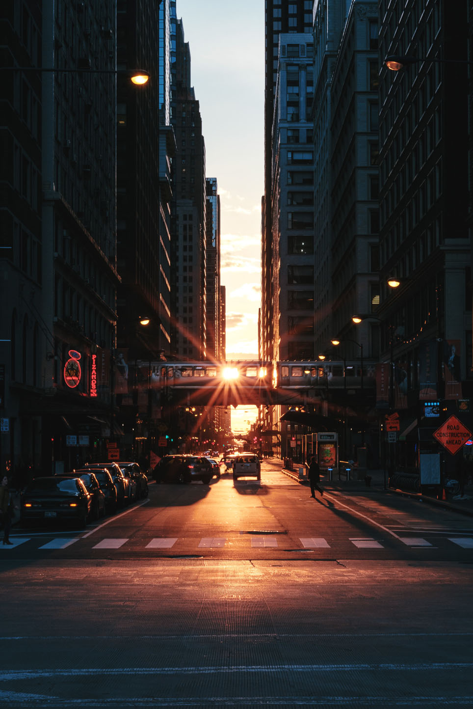 Photo of Vancouver at sunset in the city with a skywalk