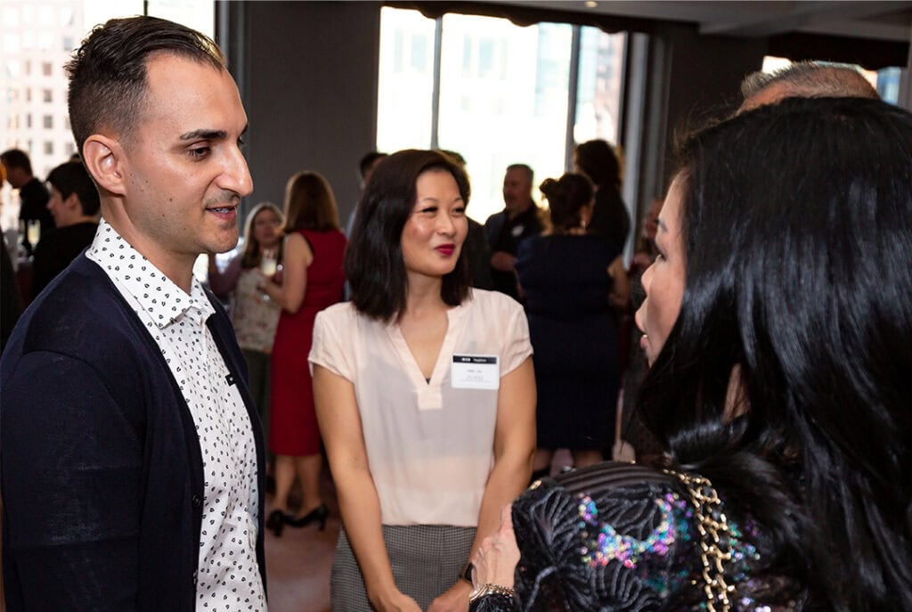 Photo of Joey and staff chatting