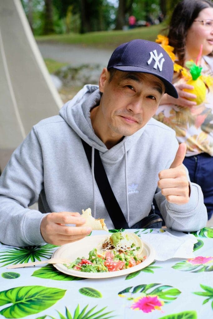 Johnny smiling with thumbs up