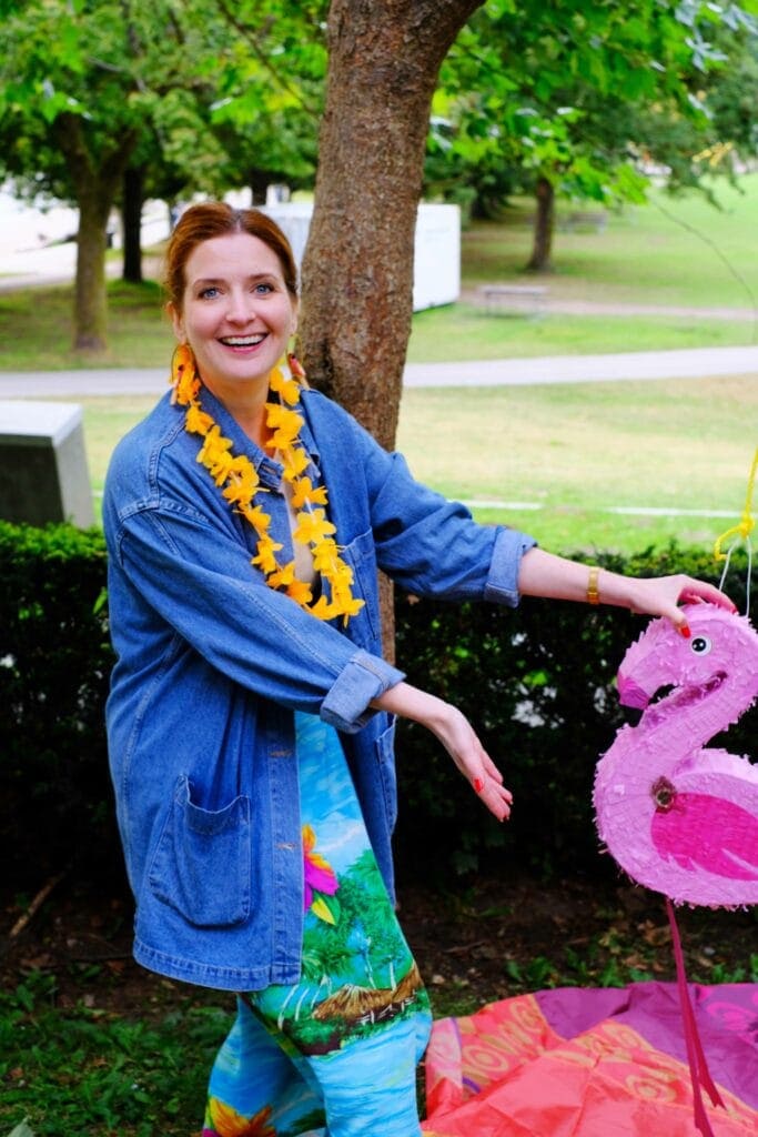 Meghan with a pink flamingo pinata