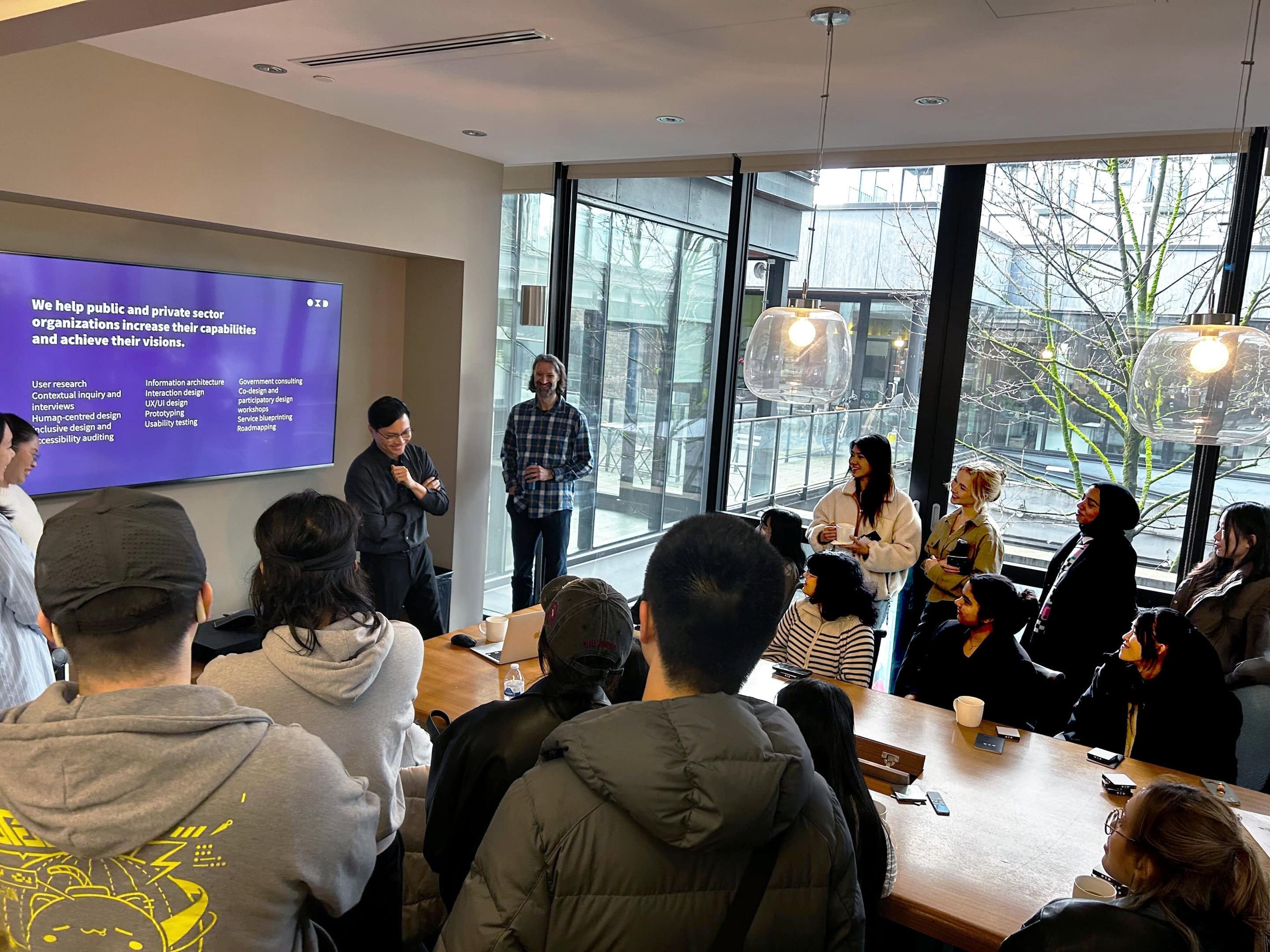 Photo of Interaction Design students from Emily Carr University of Art + Design during their studio tour at OXD.