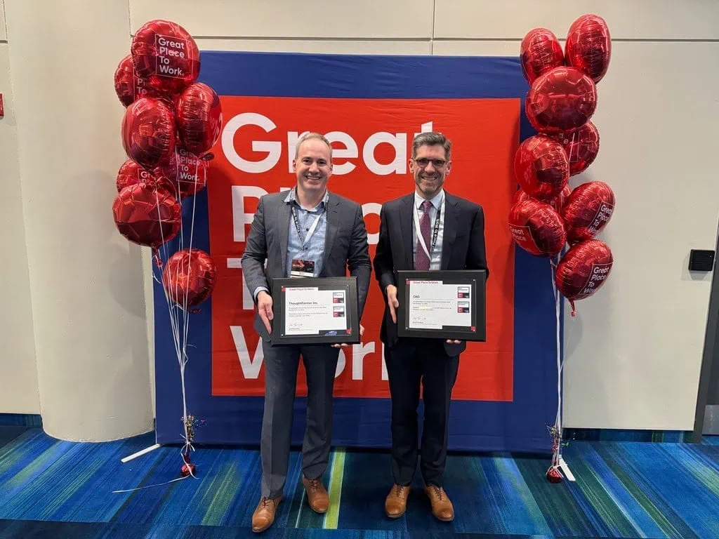 Photo of Darren and Gord shown at the award ceremony in Toronto, Ontario. OXD and ThoughtFarmer have been officially recognized in the Top 100 list for Great Place to Work in Canada two consecutive years.