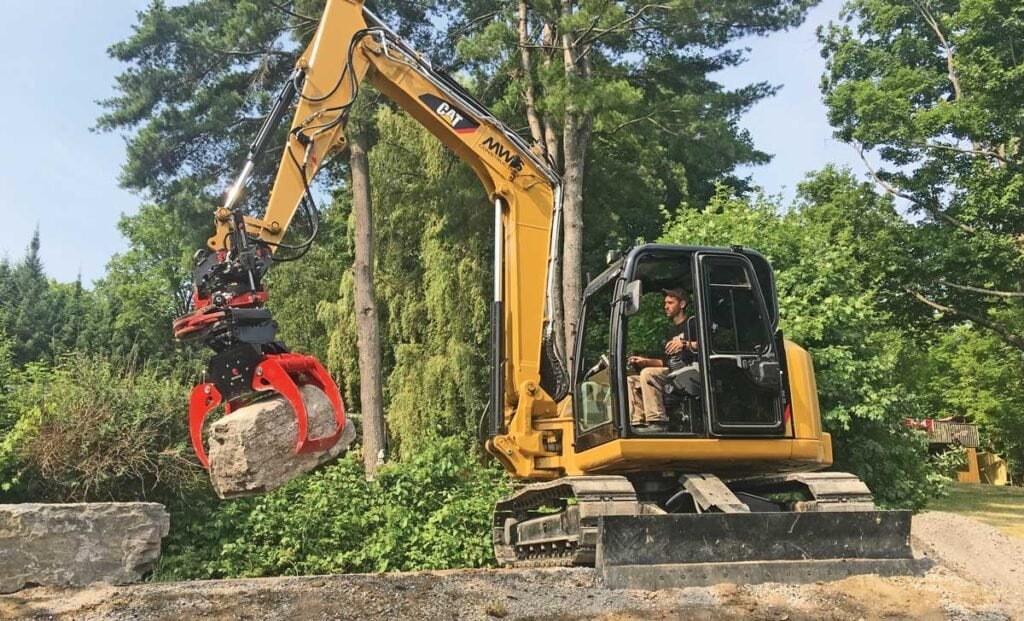 cat excavator with rototilt attachment