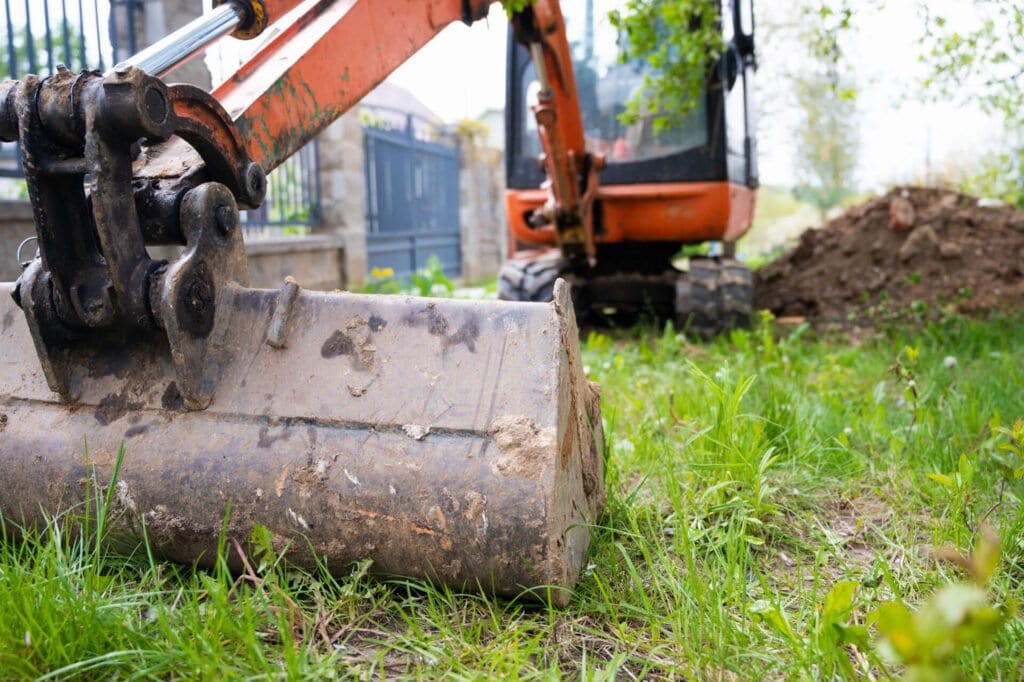 excavator orange color construction equipment rental
