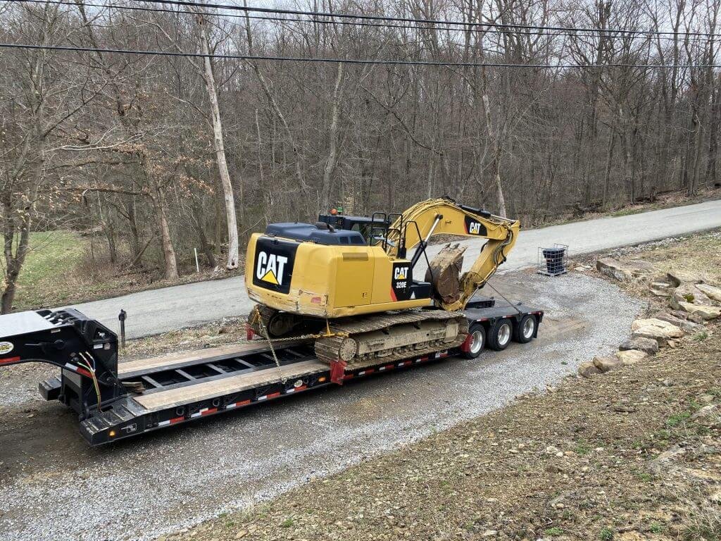 Caterpillar 320E excavator transport shipping hauling 1024x768 1