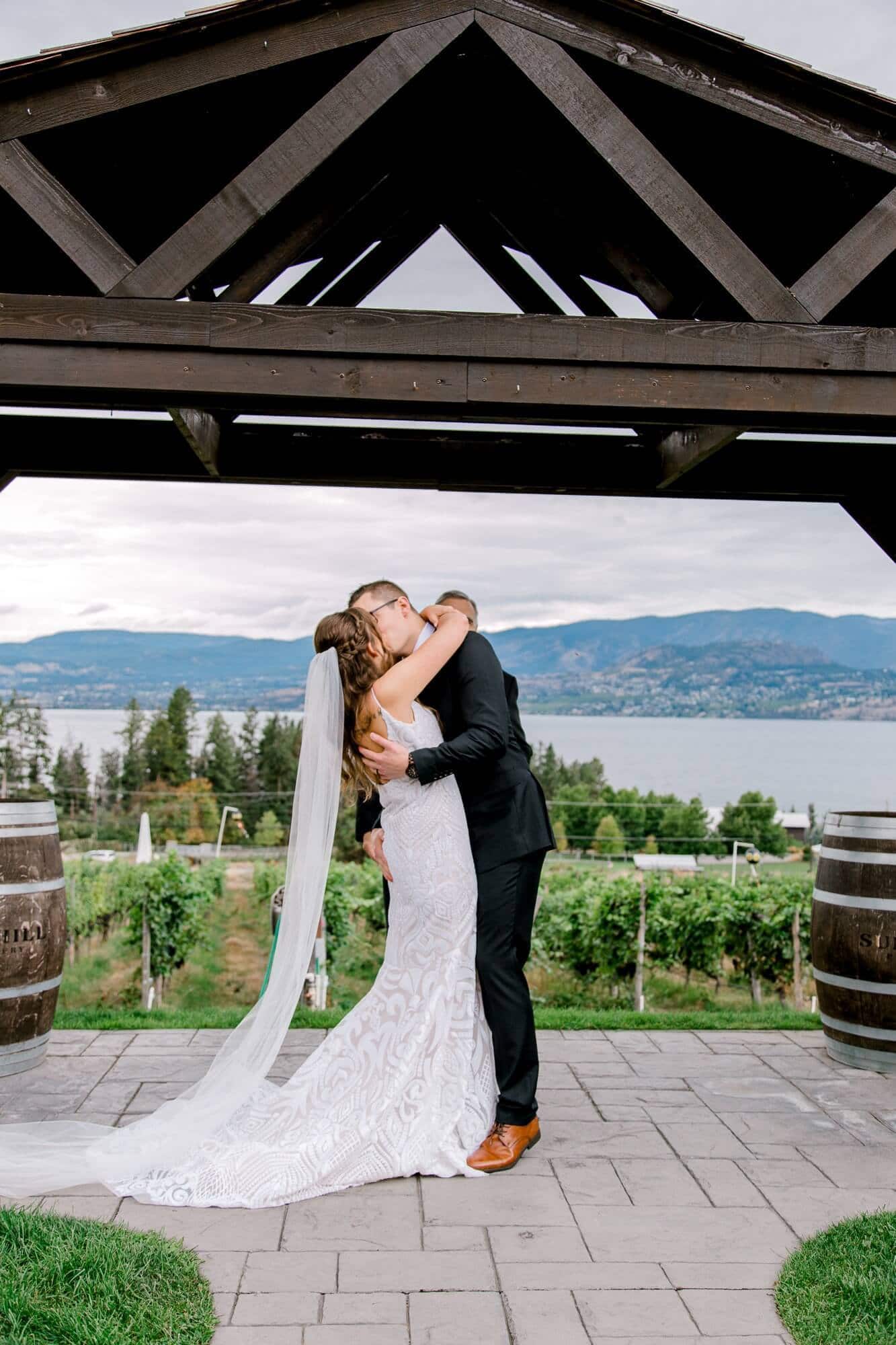 bride and groom kissing