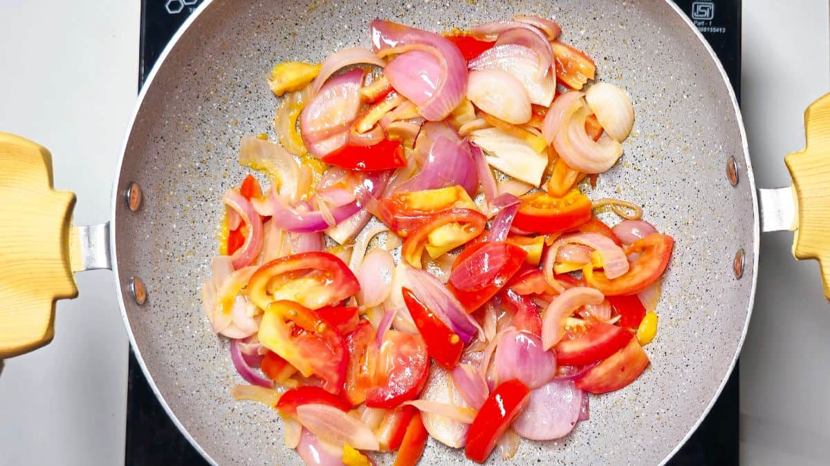 Butter Chicken Recipe Step six - Add Tomato and fry