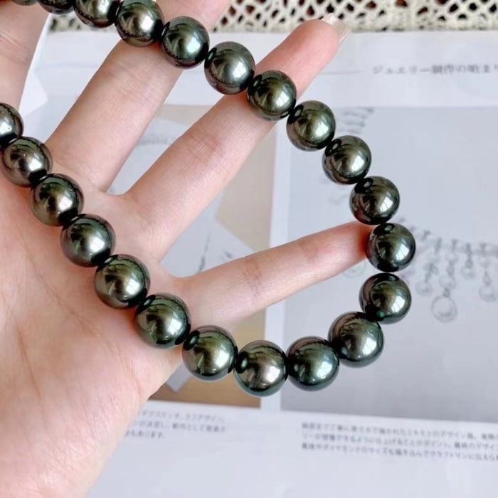 11-13.0mm AAA runde schwarze Tahitiperlen Collier – Bild 5