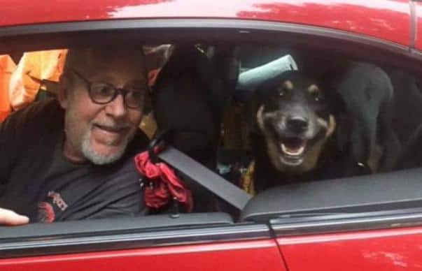 butterbean dog abandoned at gas station with new owner