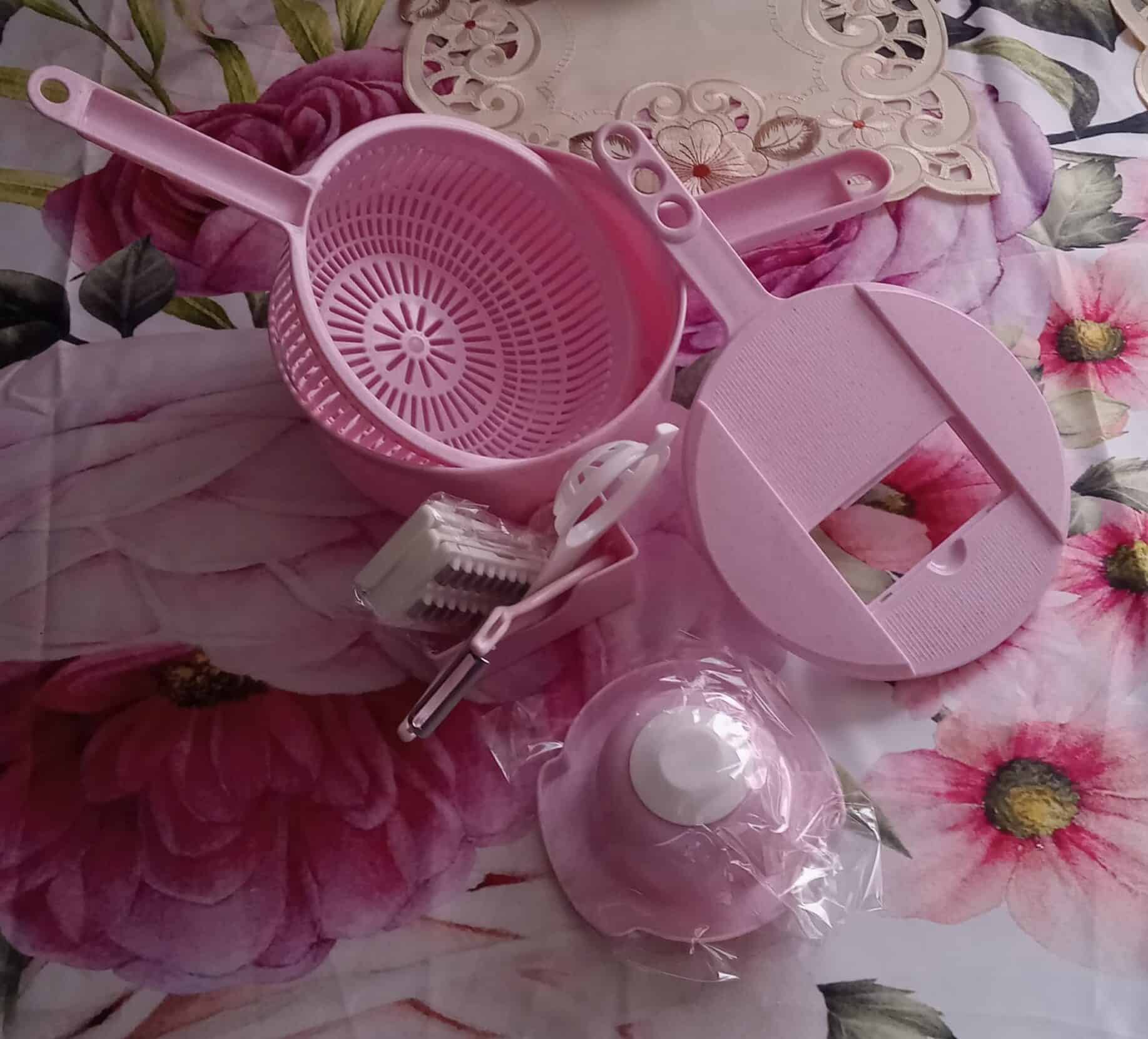 Pink Mandoline 12-in-1 Slicer, kitchen slicer, food prep tool, versatile slicer, mandoline slicer, food prep gadget, vegetable slicer, peeler attachment, kitchen gadgets, kitchen tools, food slicing, shredding tool, kitchen safety gadgets